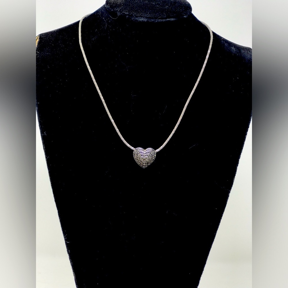 Silver marcasite heart pendant necklace 18”with matching earrings.